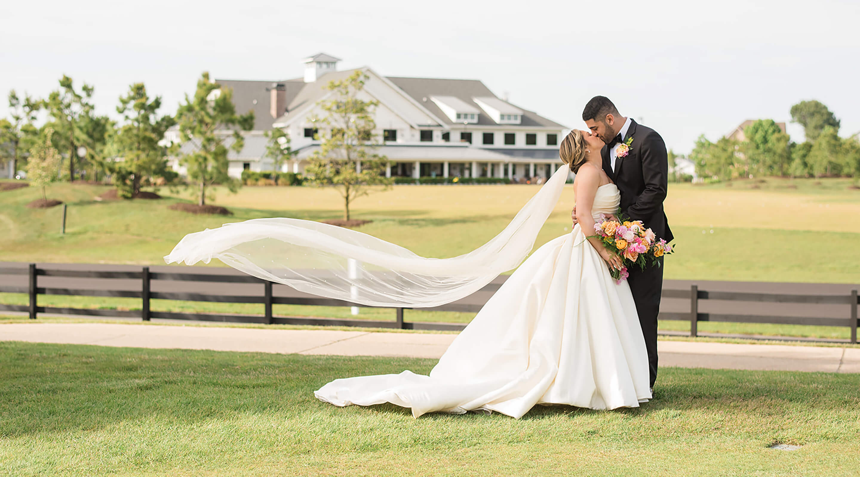 bride and groom on the golf course