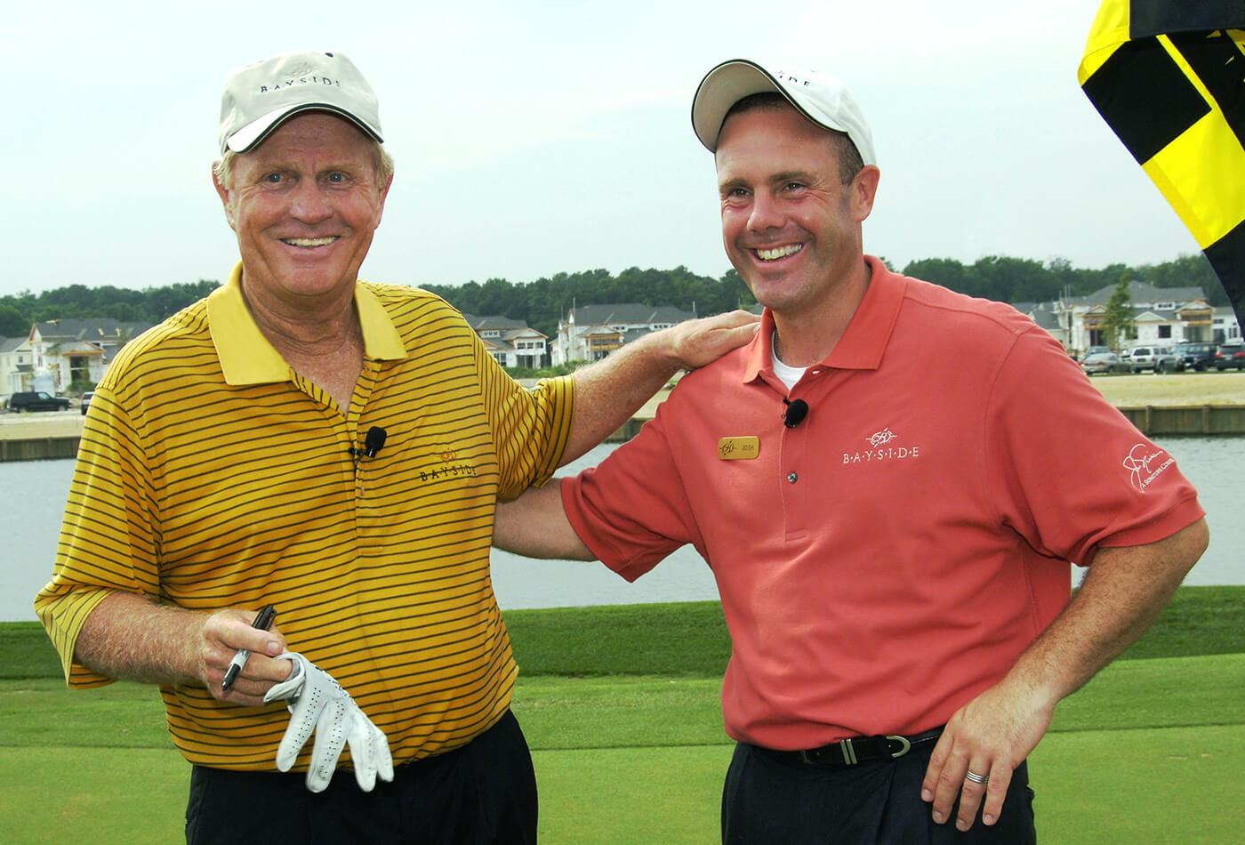 golfers posing for picture