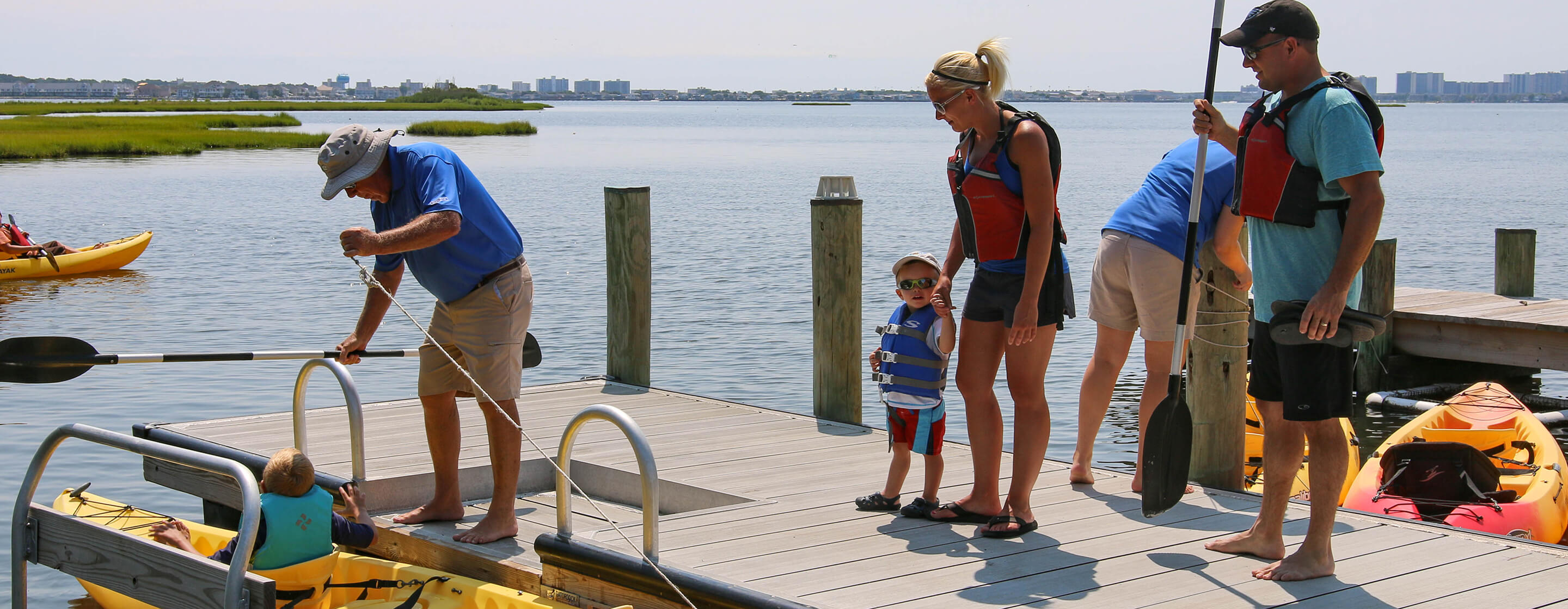 family on a dock